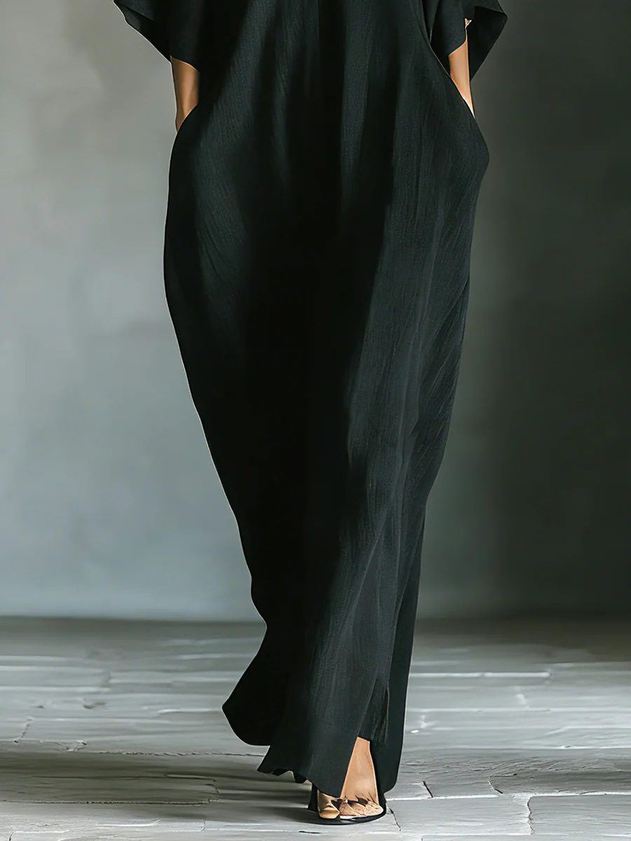 Alessandra | Vestido largo negro oversize minimalista con mangas kimono
