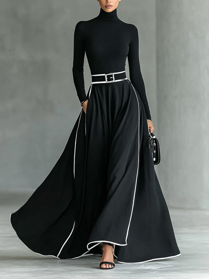 Vestido Maxi Negro con Costuras Blancas, Cuello Alto, Manga Larga y Cintura Entallada