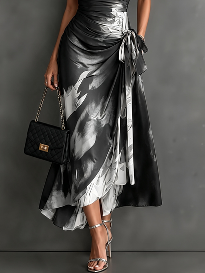 Vestido Midi Cruzado Abstracto Rojo y Negro con Cuello Camisero, Escote en V, Manga Corta, Cintura Anudada y Bajo Asimétrico con Volante