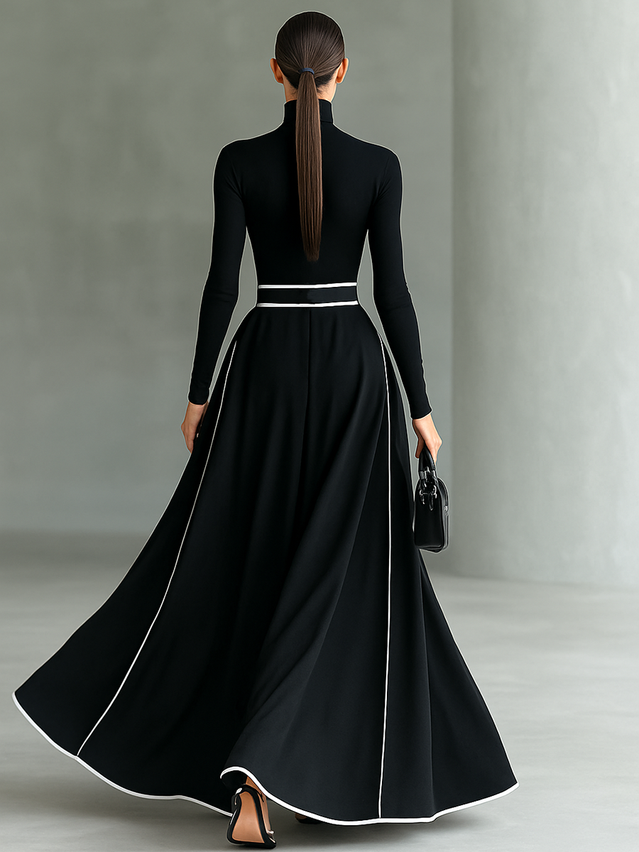 Vestido Maxi Negro con Costuras Blancas, Cuello Alto, Manga Larga y Cintura Entallada