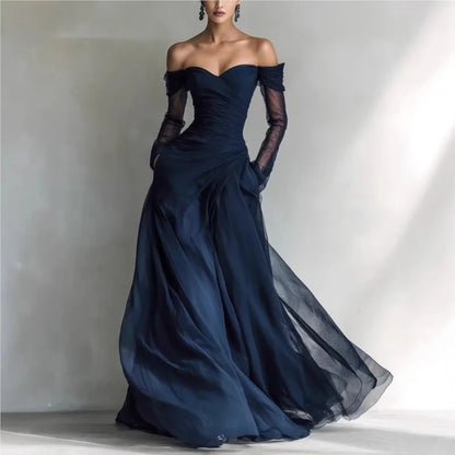 Eleonora | Vestido largo de hombros descubiertos con inserciones de malla