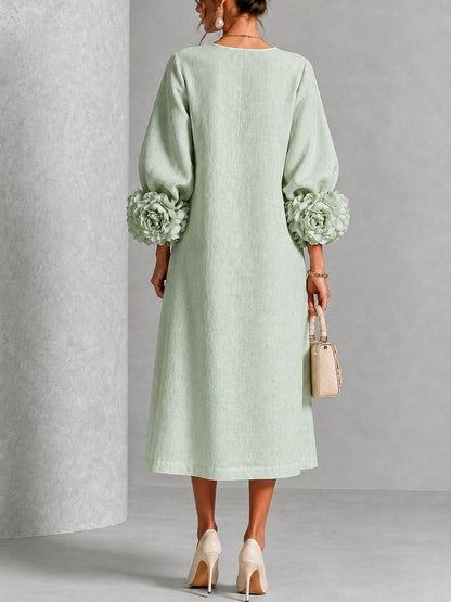 Vestido Midi Verde Salvia Místico con Botones de Flores y Mangas Florales Extravagantes