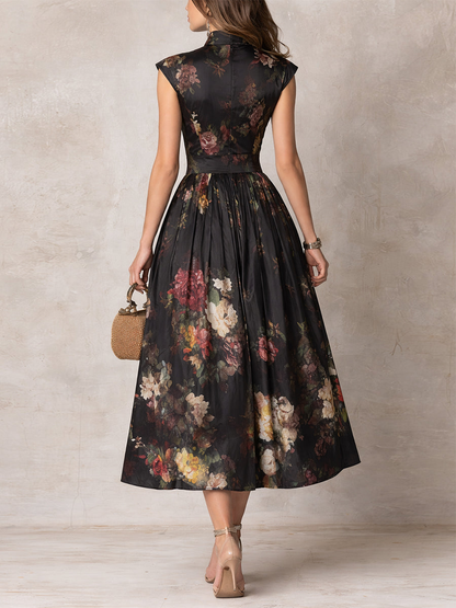 Violetta | Vestido midi negro de satén plisado con motivo floral y escote de gota