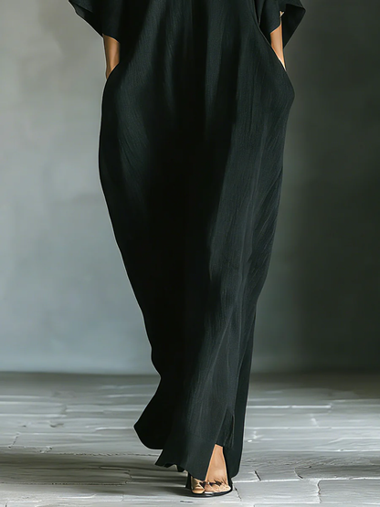 Alessandra | Vestido largo negro oversize minimalista con mangas kimono