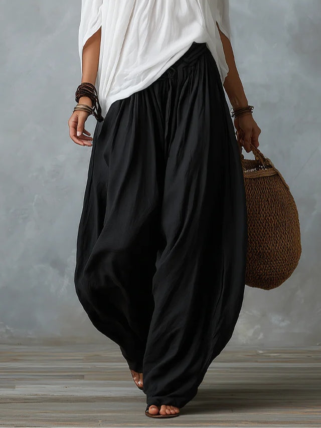 Top Blanco de Hombros Descubiertos y Pantalón Farol Acampanado