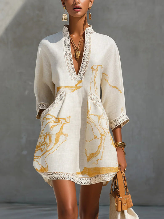 Donatella | Mini vestido blanco con estampado mármol dorado y encaje crochet