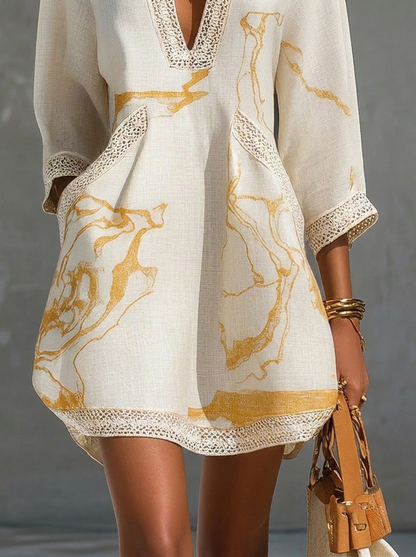 Donatella | Mini vestido blanco con estampado mármol dorado y encaje crochet